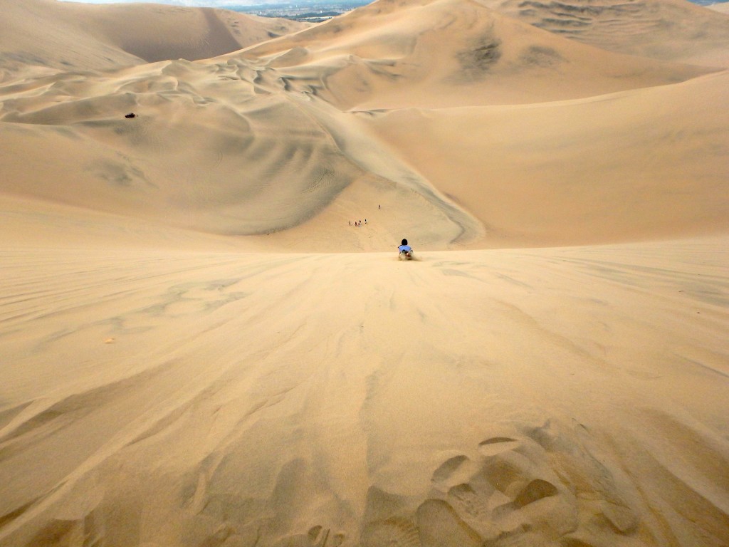 Big sand, tiny people in Huacachina